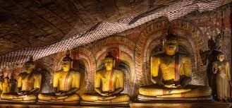 Historic Buddha statues within the Dambulla cave shrines