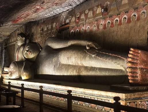 Reclining Buddha statue inside the Dambulla Cave Temple