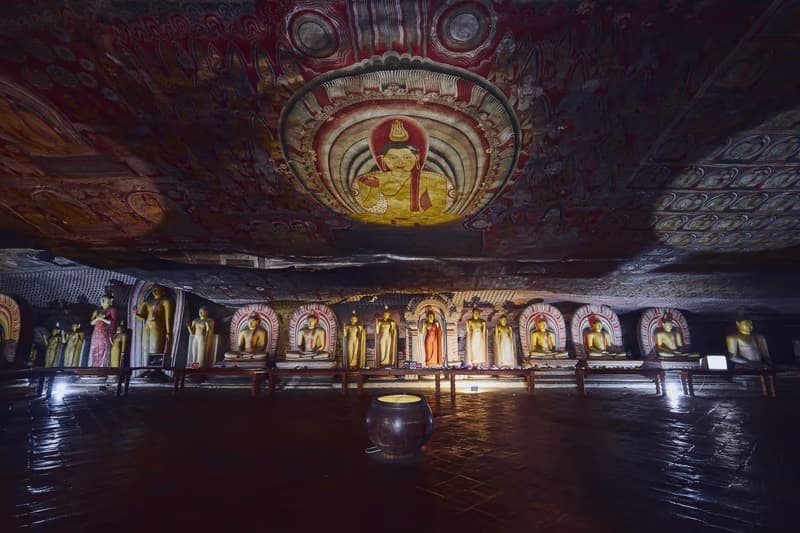 Ancient statues inside the Dambulla Cave Temple