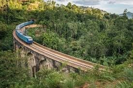 Train crossing the Nine Arch Bridge in Ella