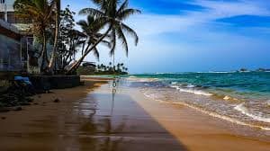 Tropical beach at Hikkaduwa on Sri Lanka's southern coast
